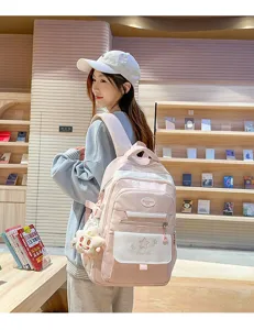 Joli sac à dos scolaire style japonais pour filles, cartable rose kawaii avec étoiles.