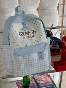 Kawaii Japanese style school backpack, blue and white polka dot design with cute cat embroidery.