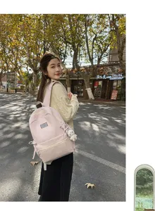 Stijlvolle roze canvas rugzak voor studenten, grote capaciteit casual dagelijkse schooltas.
