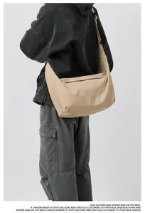 Casual large capacity khaki crossbody messenger bag, detail view showing adjustable strap.