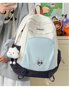 Large capacity color block casual backpack for women and students with cute plush pendant.