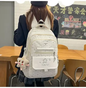 Sac à dos style collégien japonais mignon pour filles avec motif d'étoiles, cartable décontracté.