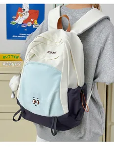 Large capacity color-blocked casual backpack for women student school travel daily use.