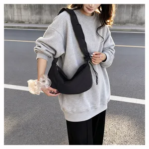 Casual black nylon pleated crossbody bag large capacity dumpling shoulder bag for women.