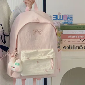 Japanese ins style pink backpack for school and daily casual wear with cute bow embroidery.