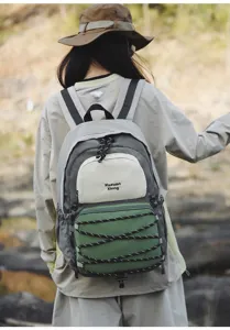 Outdoor casual backpack for women, multi-color student travel daypack with bungee cords.