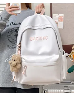 Japanese style embroidered backpack for women, cute school bag with lovely bear pendant.