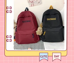 Japanese style minimalist embroidered canvas school backpack for students, casual daily rucksack.