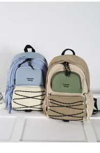 Casual outdoor canvas backpack with multi pockets and drawstring design, perfect for travel.