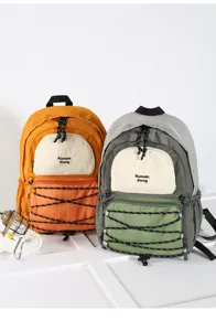 Minimalist outdoor backpack for women, stylish couple sports travel daypack with front pockets.