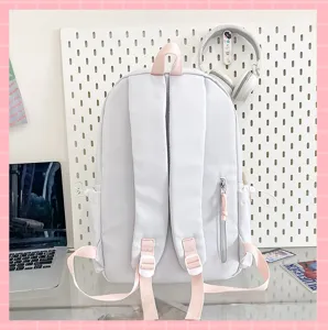 Casual Japanese style backpack detail, light grey with pink straps, versatile everyday school bag.