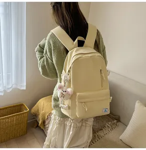 Korean style casual canvas school backpack for teen girls, lightweight candy color daypack.