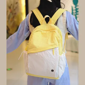 Zaino casual stile coreano da donna, borsa da viaggio leggera per scuola grande capacità giallo bianco.