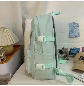Mint green student backpack, stylish Korean style canvas book bag with side double buckles.