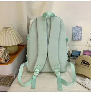 Mint green student backpack, casual school bookbag with adjustable straps for daily use.