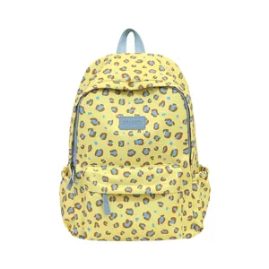 Cute aesthetic leopard print school backpack for teenage girls, large capacity casual daypack.