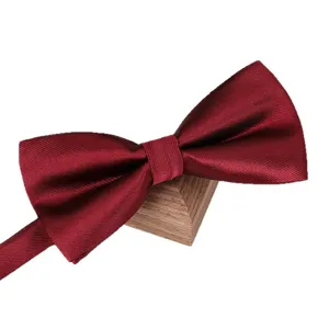 Wine red bow tie for men, stylish wedding tuxedo bow tie, formal suit neckwear accessory.