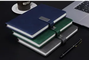 Set of three A5 leather notebooks with metal buckle, ideal for business office and study use.