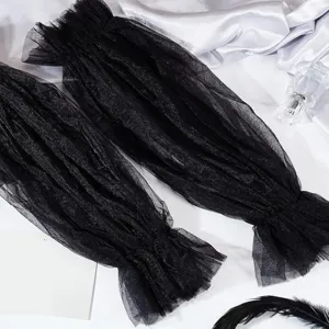 Detail view of gothic black mesh tulle false sleeves, sheer elastic arm warmers with ruffles.