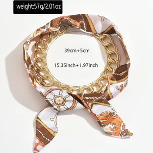 Chunky gold chain silk scarf necklace, vintage chained choker collar fashion accessory.