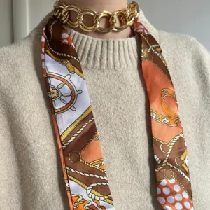 Chunky gold chain choker necklace with stylish printed silk scarf twilly for women fashion