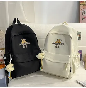 Casual college style canvas backpack for women, large capacity travel school bag with cute dog print.