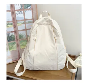 Korean style minimalist canvas backpack for women solid color casual school travel daily use.