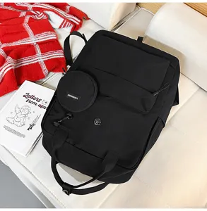 Schwarzer Freizeit Studenten Rucksack und Reise Tagesrucksack mit kleiner Vordertasche.