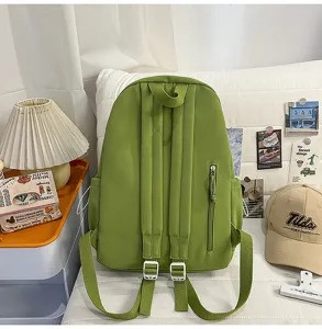 Green casual backpack detail view showing sturdy shoulder straps and functional side zipper pocket.