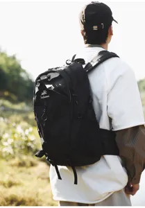 Outdoor large capacity hiking backpack in black, featuring comfortable shoulder straps.
