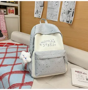 Zaino in stile giapponese a blocchi di colore per ragazze, grande capacità con stampa a stelle.