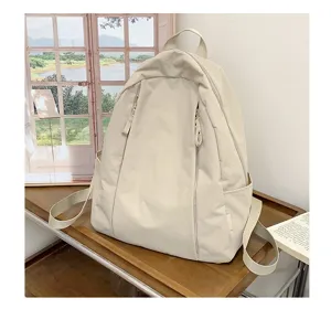 Minimalist solid beige casual backpack detail, lightweight daily school bag for women students.