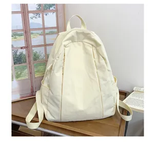 Solid color minimalist casual backpack for women, lightweight travel college student school bag.