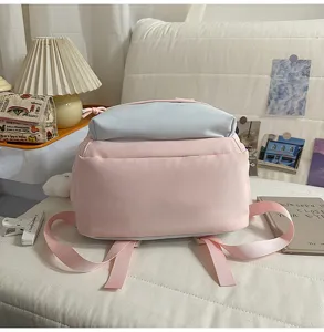 Zaino carino rosa e azzurro chiaro, borsa scolastica casual elegante per ragazze e studenti.