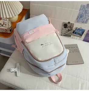 Zaino scolare in tela pastello carina con grande capacità e tasche multiple per ragazze.