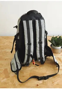 Detailed view of the outdoor mountaineering backpack showing adjustable shoulder straps and buckles.