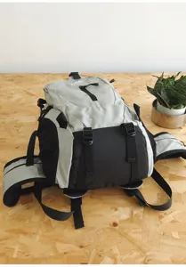 Detailed view of the outdoor hiking backpack, showing durable buckles and grey black contrast.