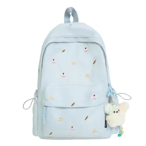 Light blue kawaii student backpack with cute embroidered donuts and cupcakes, casual school bookbag