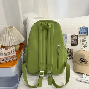 Korean style college backpack, large capacity travel school bag for students in green.