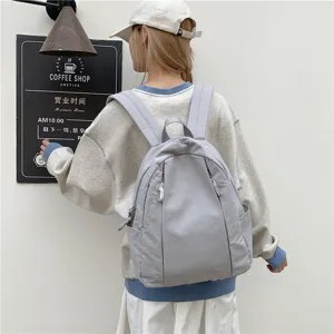 Korean style minimalist solid color backpack casual travel lightweight school bag for women