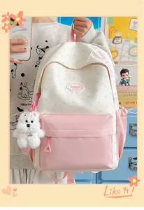 Sweet Japanese style pink white school backpack with cute bear pendant, perfect for daily travel.