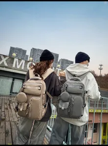Large capacity multi-pocket backpack casual travel school bag for students and daily commuting.