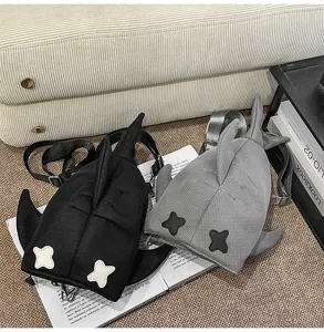 Japanese style cute shark backpack, stylish casual couple shoulder bag for travel and daily wear.