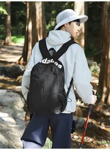 Lightweight waterproof backpack detail shot, large capacity sports travel bag for daily use.