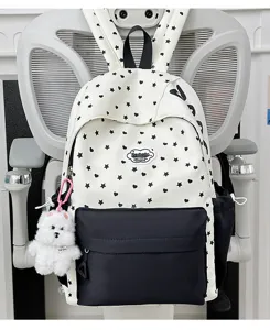 Cute Japanese style star heart print backpack with black front pocket and dog charm.