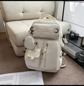Large capacity multi-pocket canvas backpack in cream white, detailed utility straps and cute mini pouch.