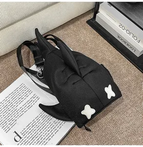Black shark shoulder bag detailed view, creative casual travel backpack for men and women.