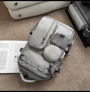 Detailed view of the multi-pocket casual backpack, highlighting compartments and texture.