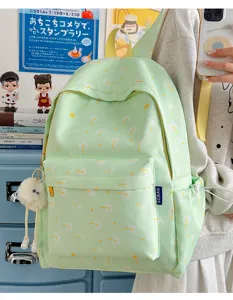 Detailed view of the cute light green backpack with dandelion print, daily casual campus style.