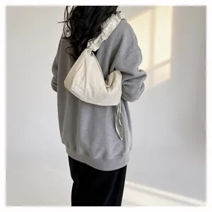 Detailed view of the casual nylon pleated crossbody dumpling bag, perfect for daily commute.